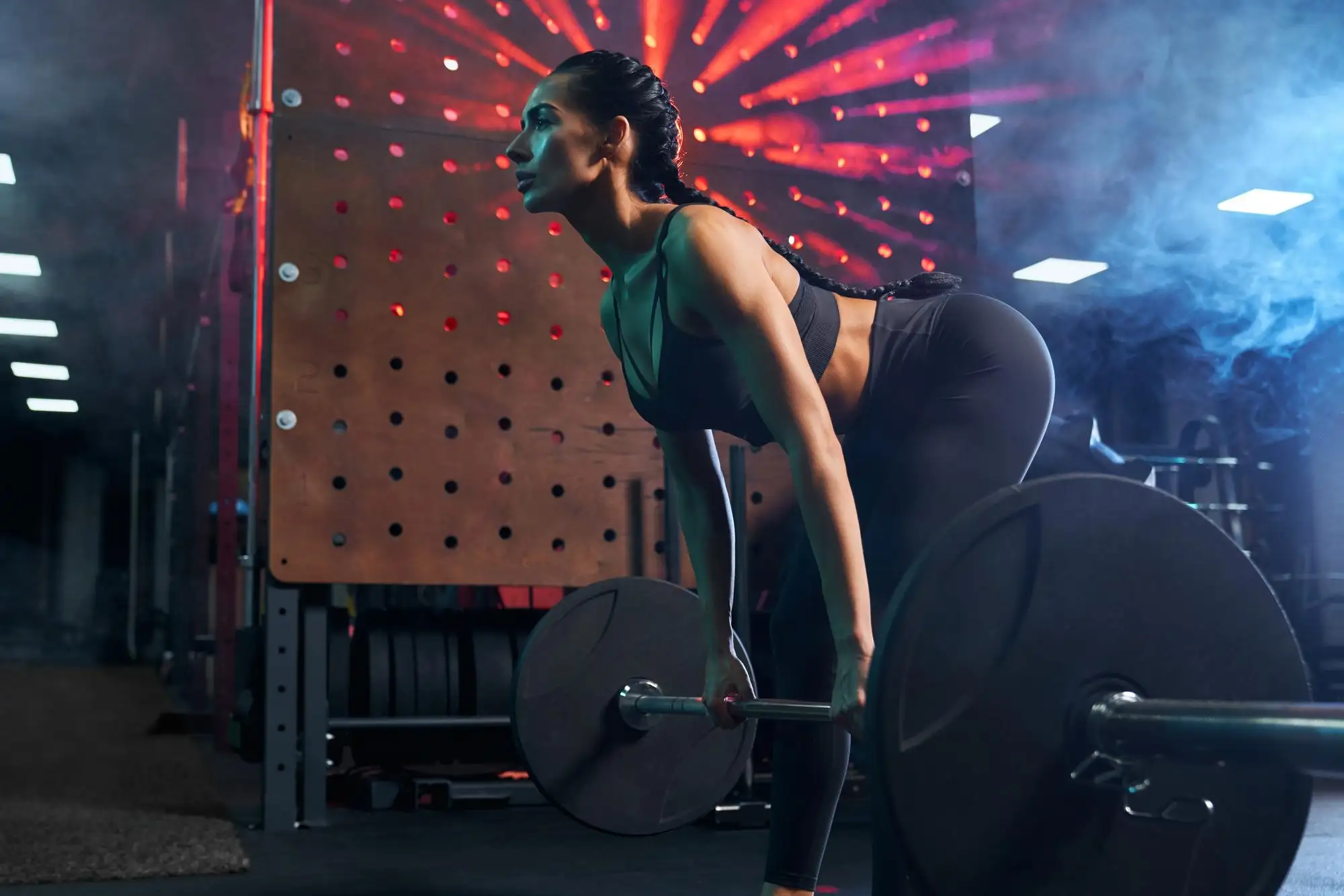 fitnesswoman doing deadlift in gym