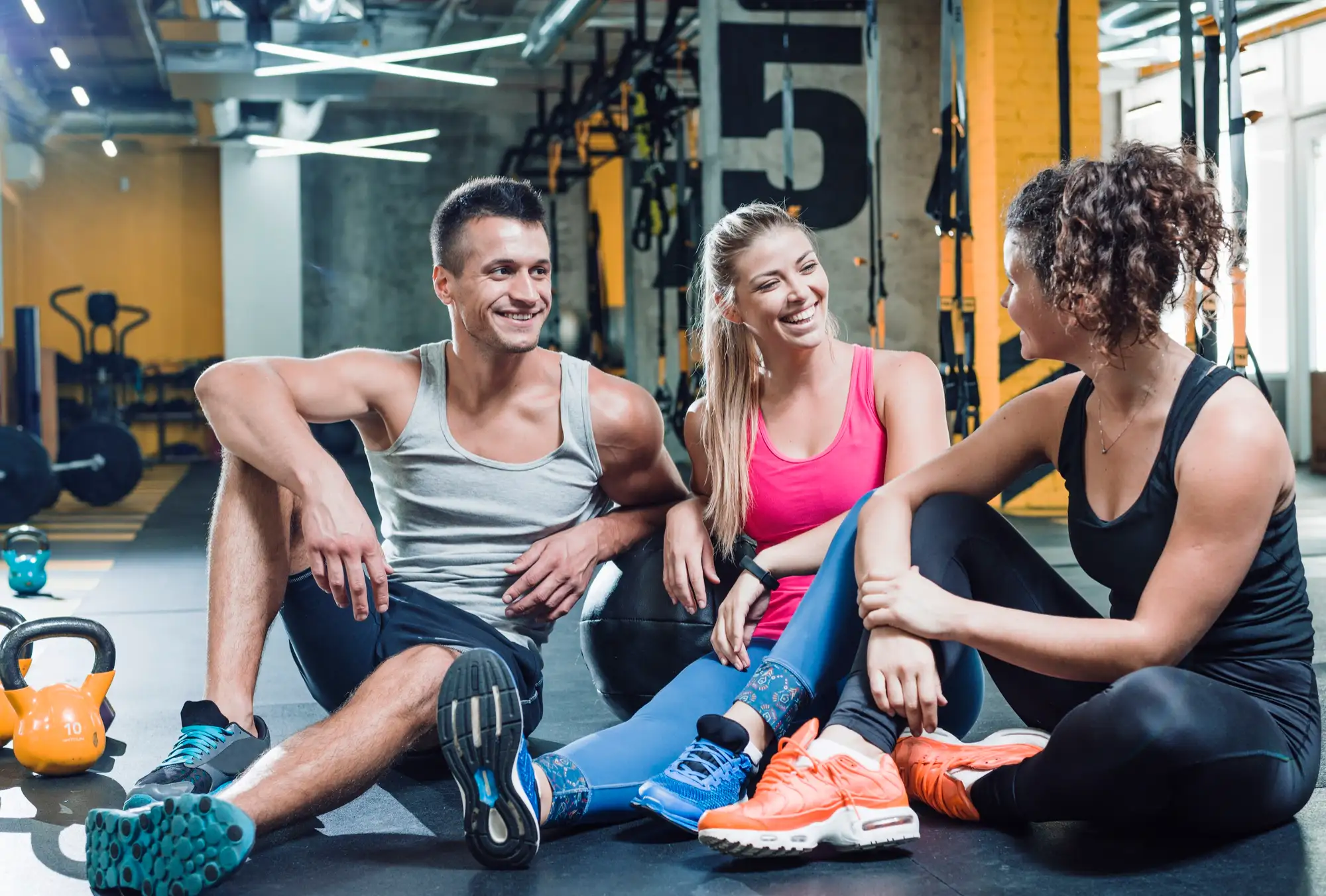 group of people after workout in gym