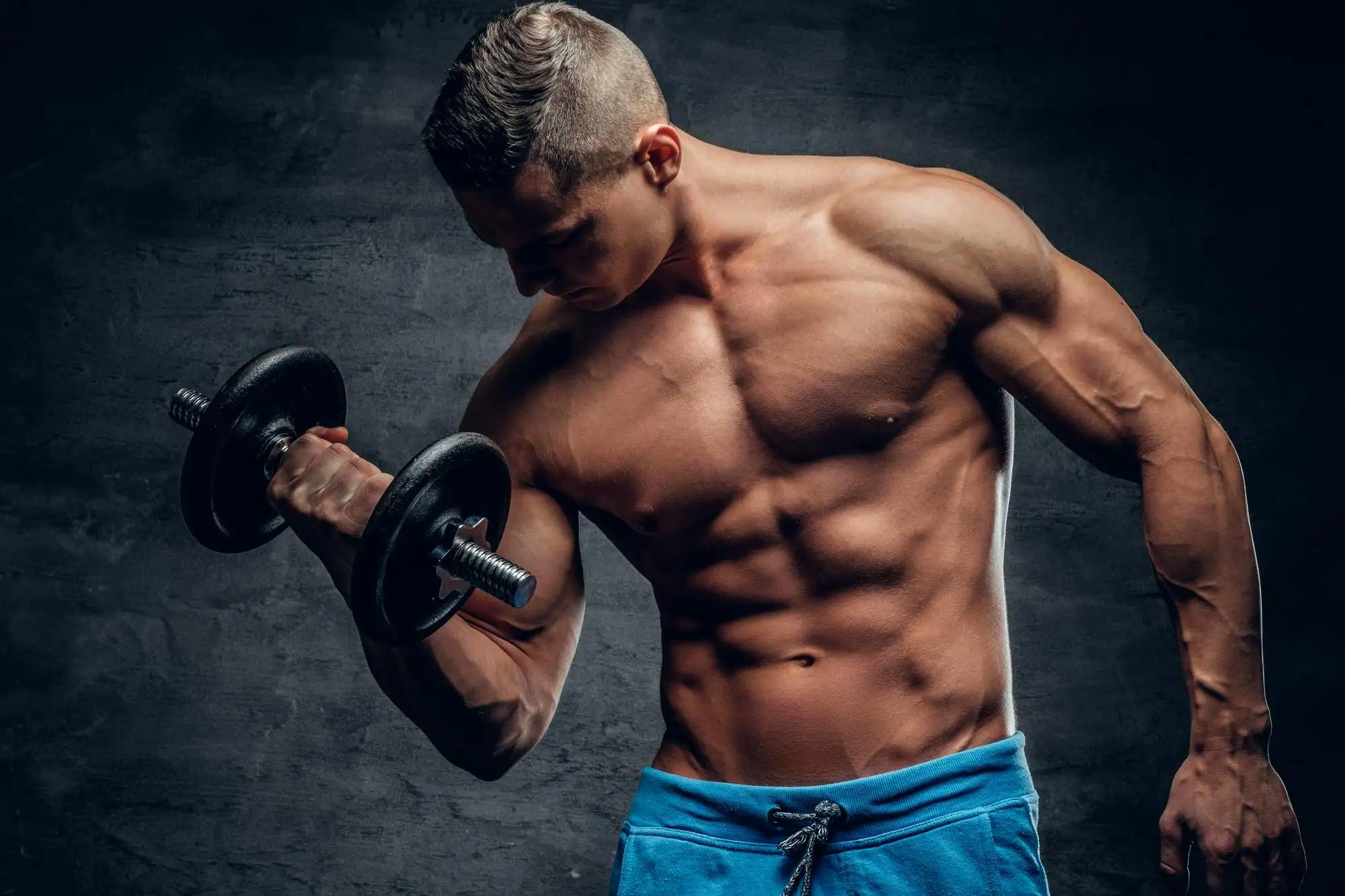 athletic male doing biceps